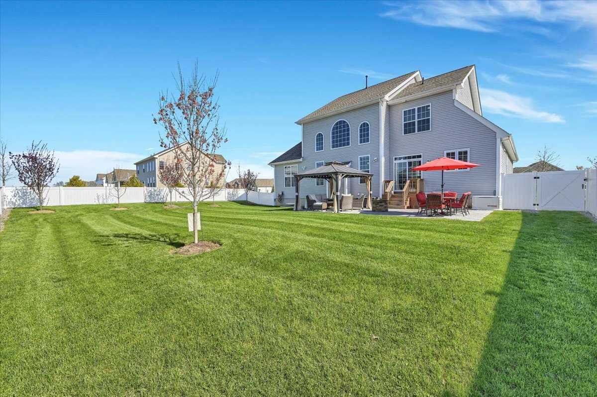 41 Pitcher Road East Fishkill, NY 12533 - Photo 32 of 35 a front view of house with a garden and patio