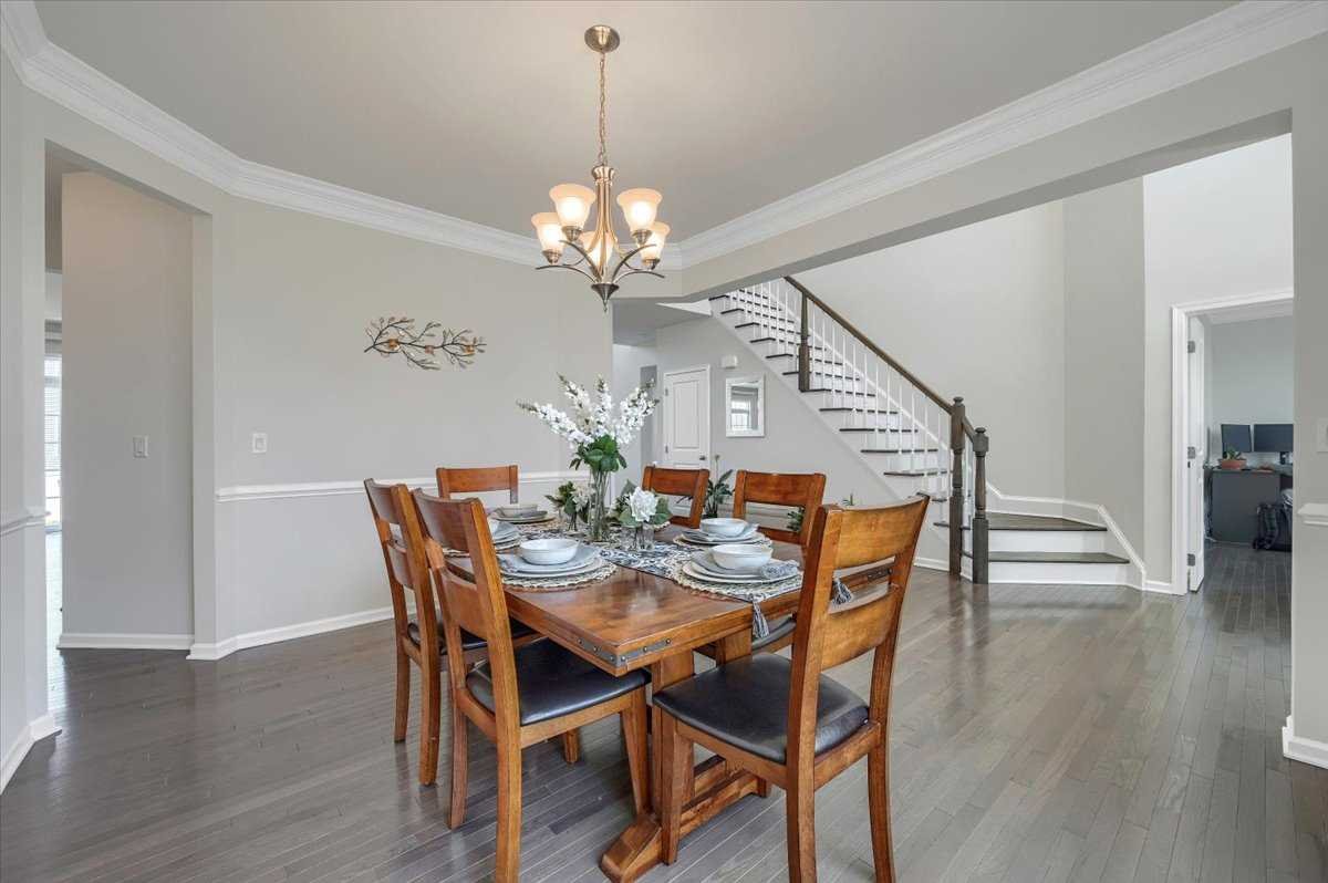 41 Pitcher Road East Fishkill, NY 12533 - Photo 4 of 35 a view of a dining room with furniture wooden floor and chandelier