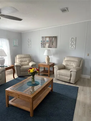 a living room with furniture and a couch