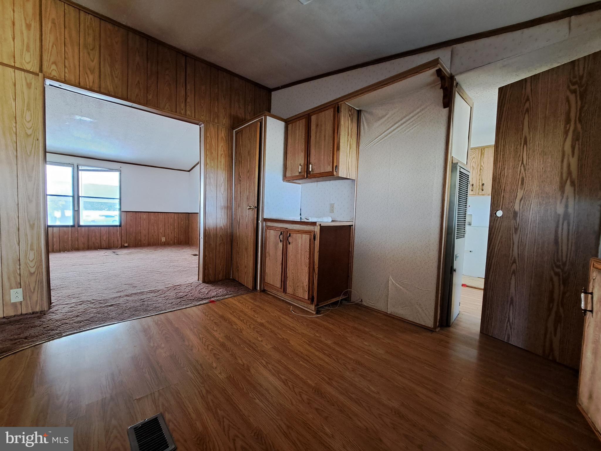 6706 Whiteley Road Hurlock, MD 21643 - Photo 13 of 45 a view of entryway with wooden floor