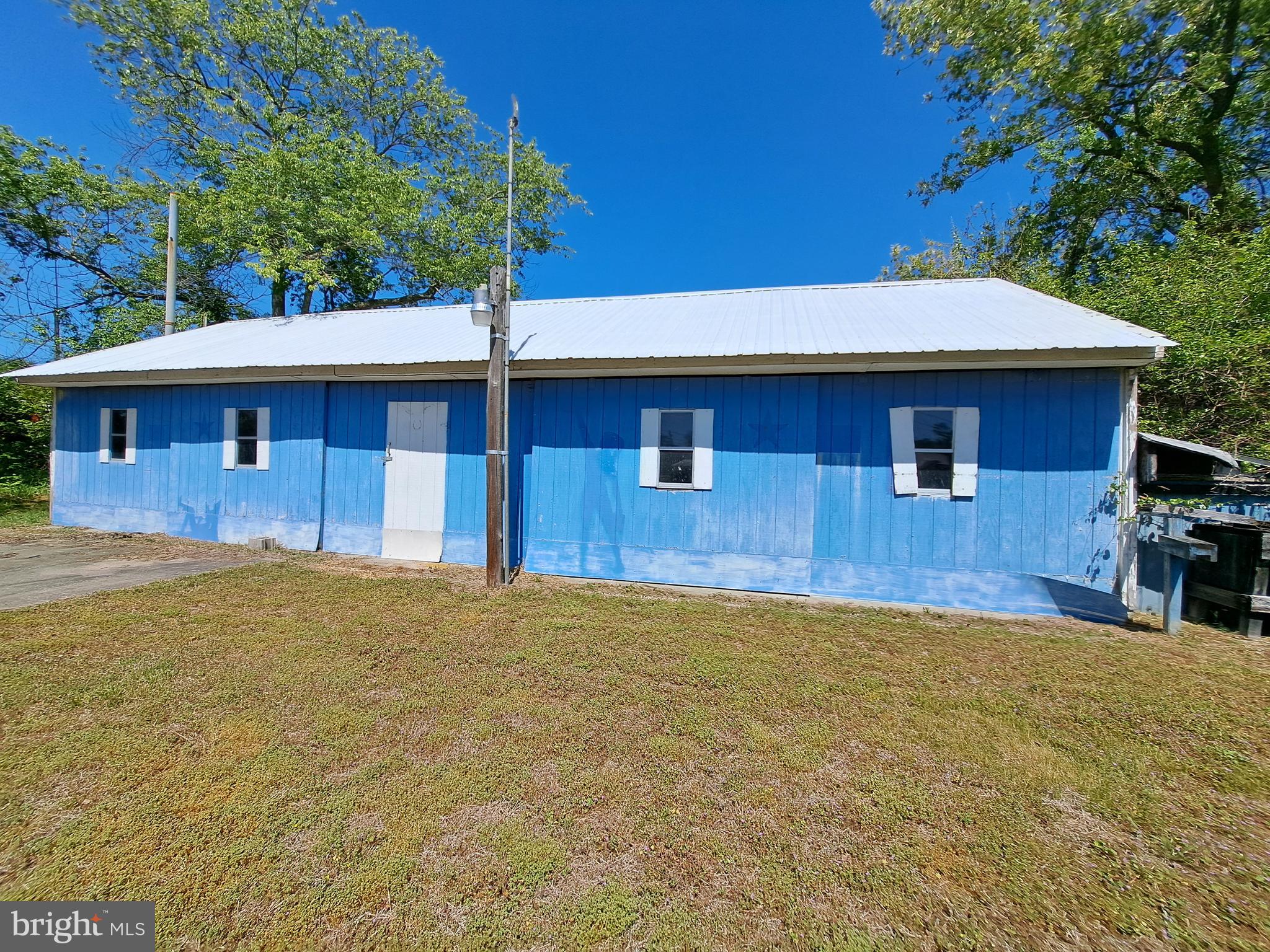 6706 Whiteley Road Hurlock, MD 21643 - Photo 35 of 45 a front view of a house with a yard