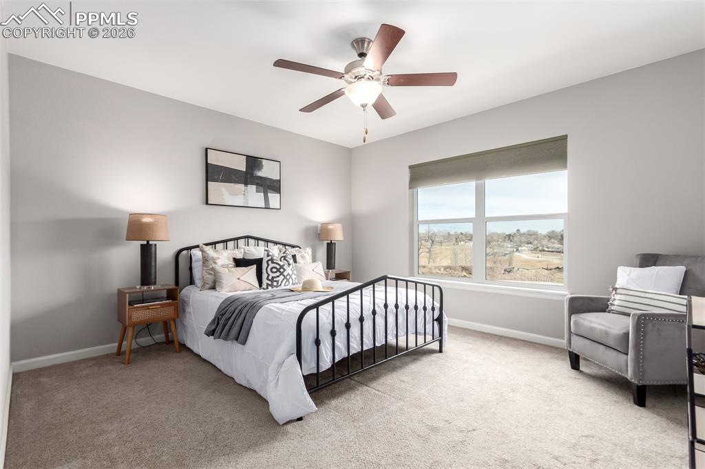 7956 Osage Street Denver, CO 80221 - Photo 16 of 48 Bedroom with carpet flooring and a ceiling fan