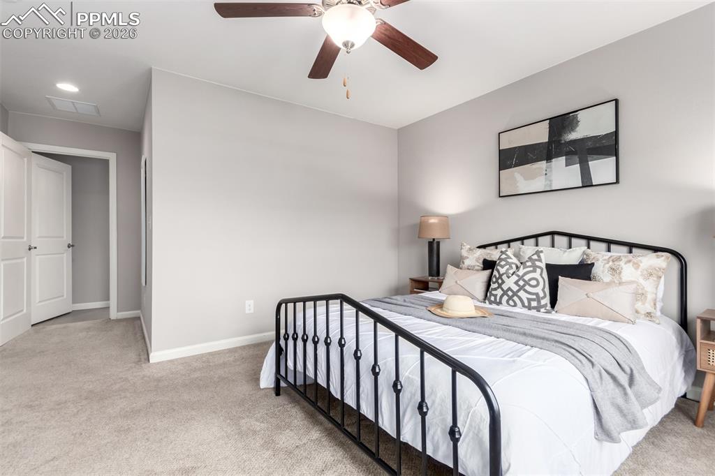 7956 Osage Street Denver, CO 80221 - Photo 17 of 48 Bedroom with carpet flooring and a ceiling fan