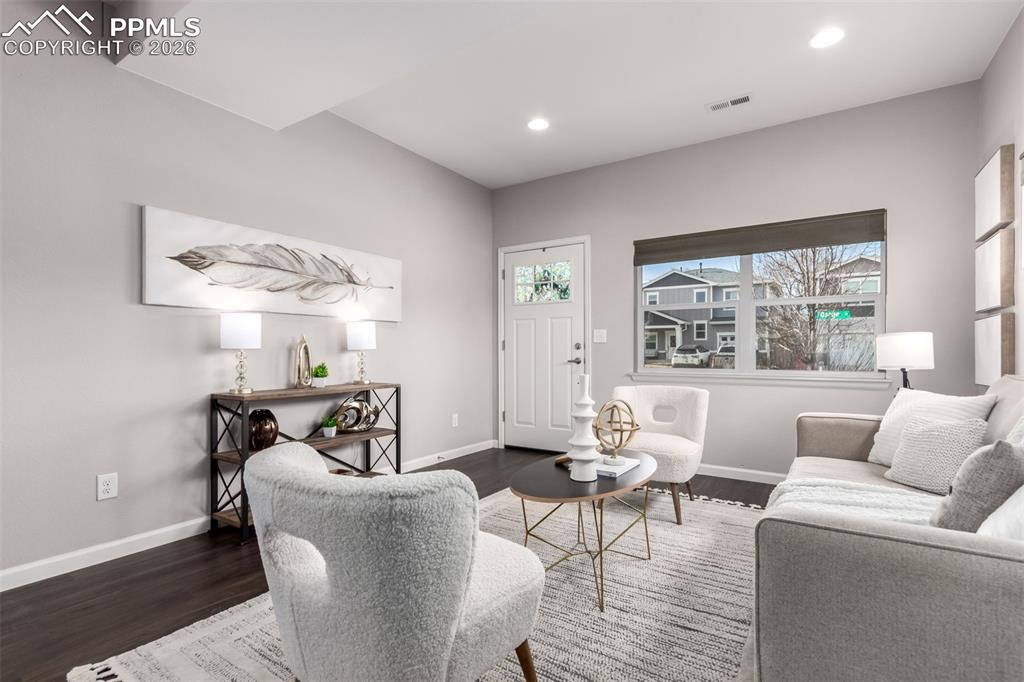 7956 Osage Street Denver, CO 80221 - Photo 5 of 48 Living room featuring wood finished floors and recessed lighting