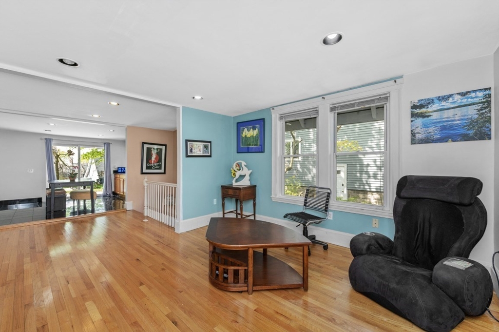15 Murray Hill Road Medford, MA 02155 - Photo 11 of 30 a living room with furniture and a wooden floor