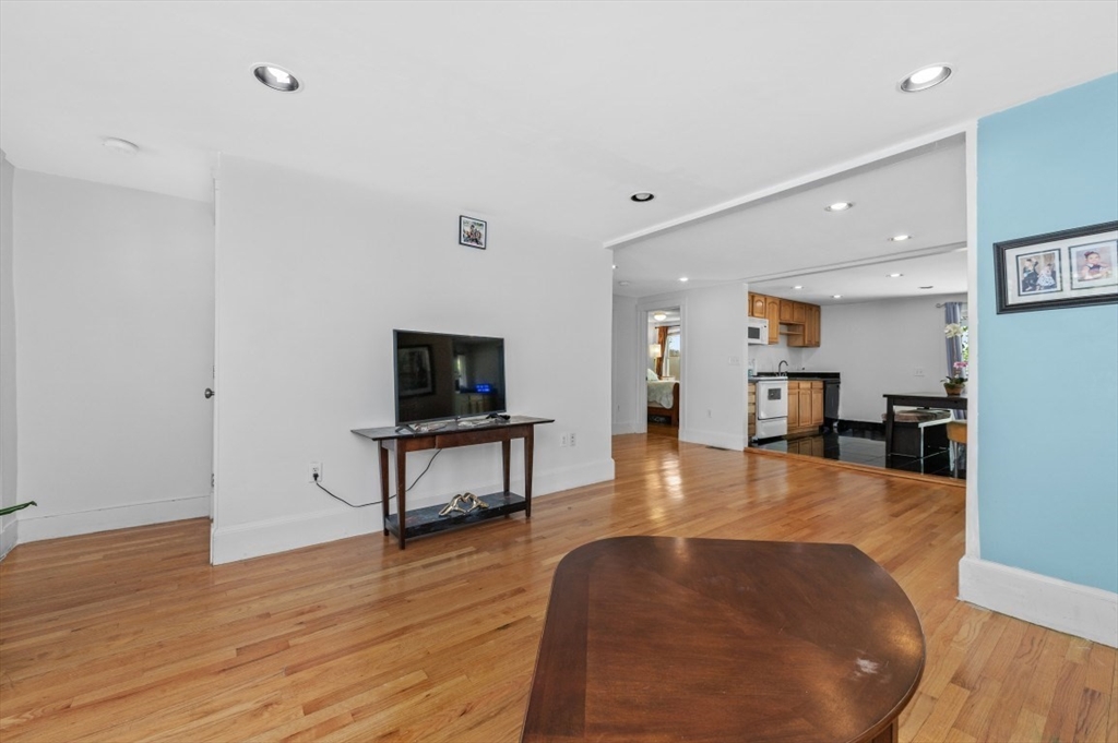 15 Murray Hill Road Medford, MA 02155 - Photo 12 of 30 a living room with furniture and a flat screen tv