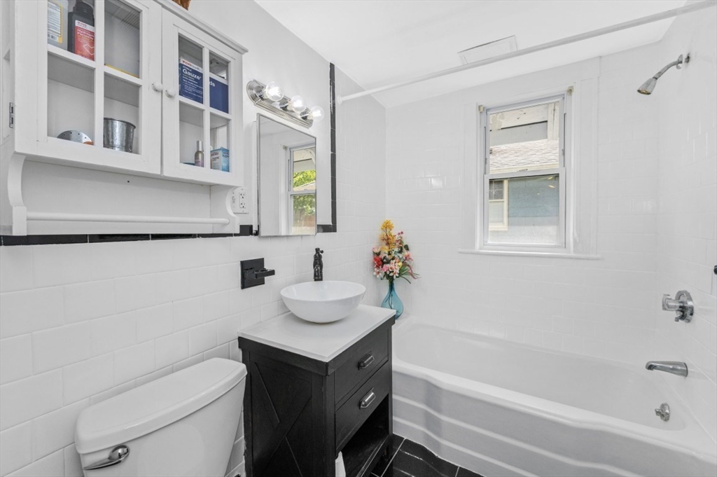 15 Murray Hill Road Medford, MA 02155 - Photo 20 of 30 a bathroom with a sink a toilet and shower