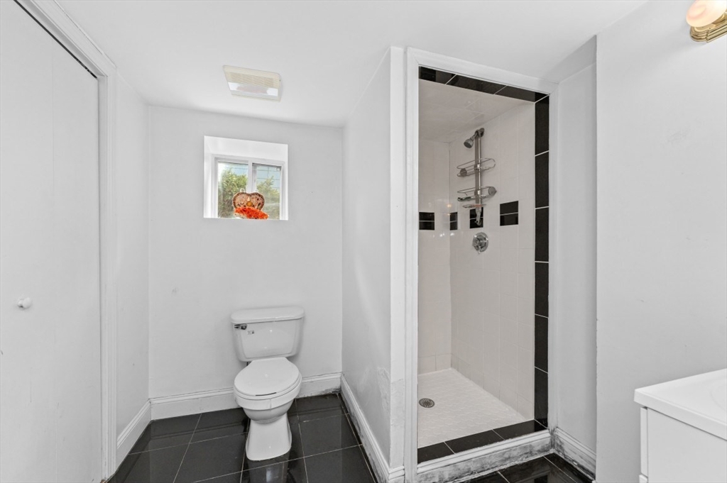 15 Murray Hill Road Medford, MA 02155 - Photo 26 of 30 a bathroom with a toilet and a shower