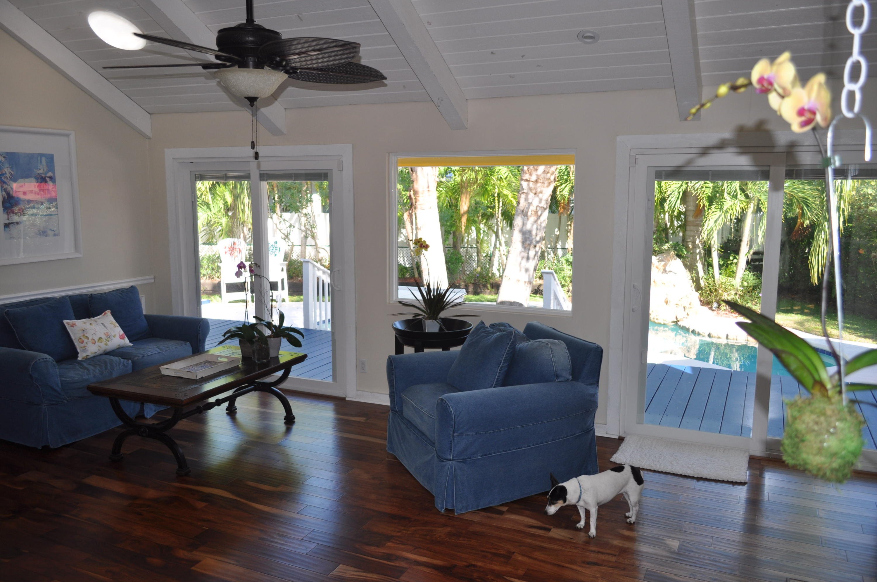 114 Faith Way Jupiter, FL 33458 - Photo 24 of 36 LIVING ROOM POOL VIEW