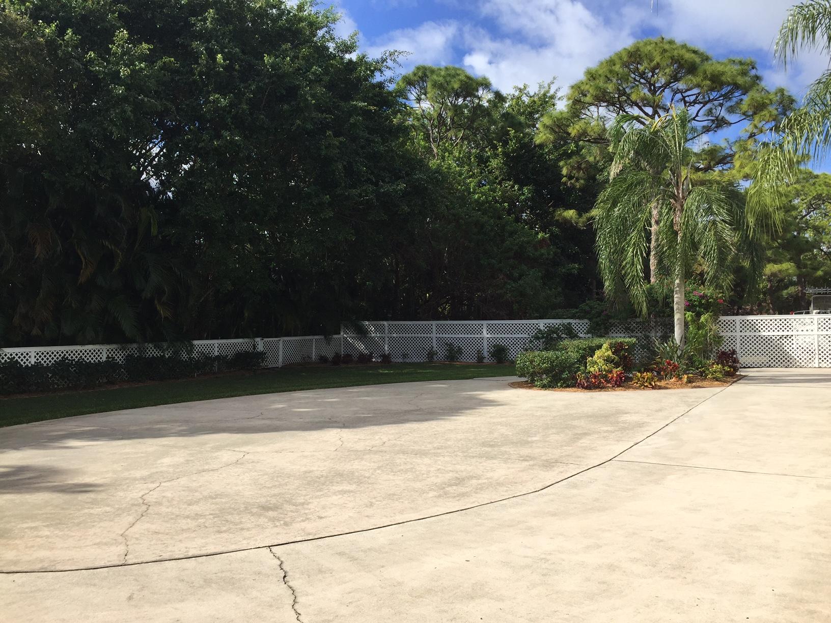 114 Faith Way Jupiter, FL 33458 - Photo 30 of 36 DRIVEWAY