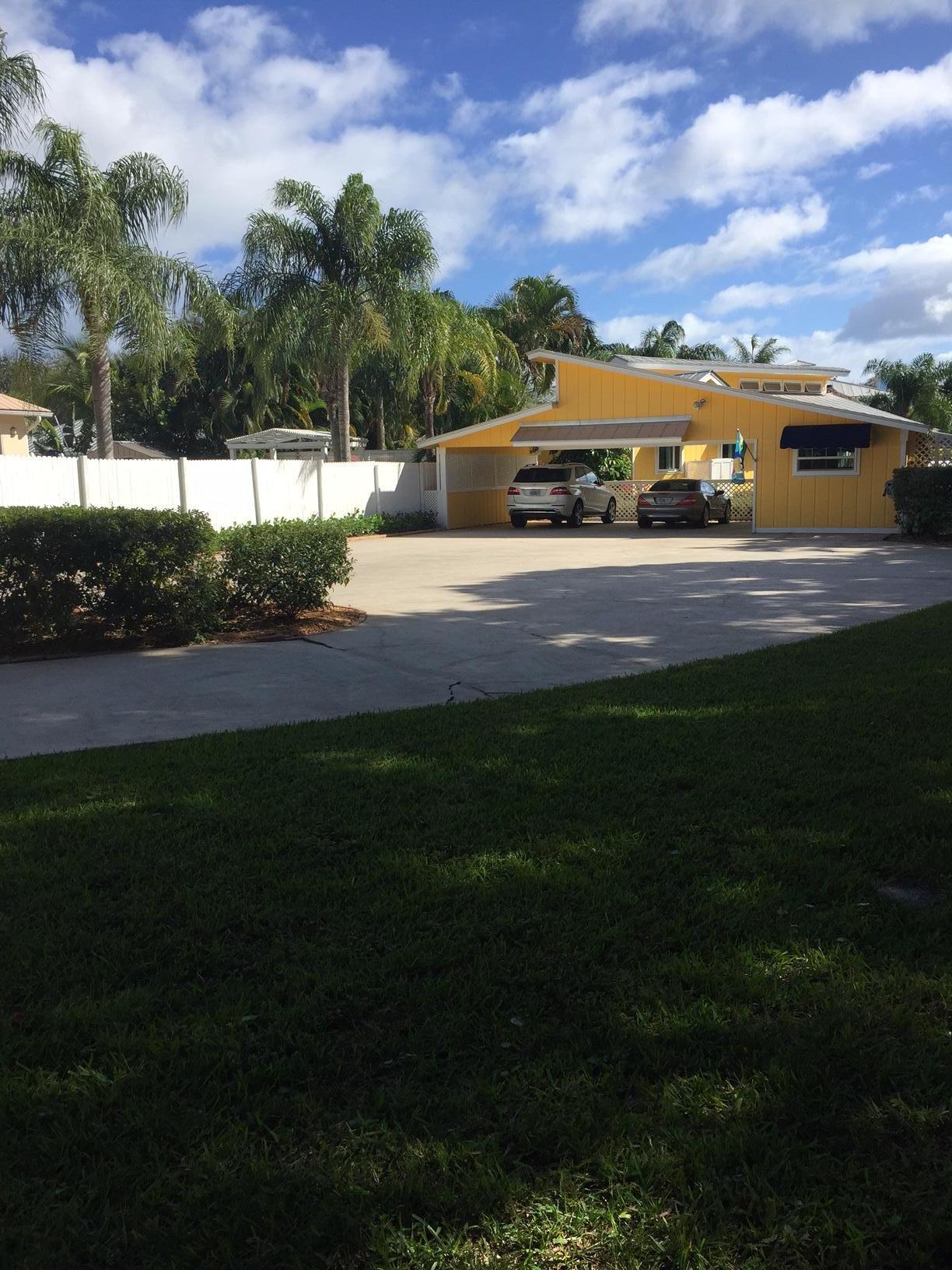 114 Faith Way Jupiter, FL 33458 - Photo 4 of 36 DRIVEWAY AND PARKING