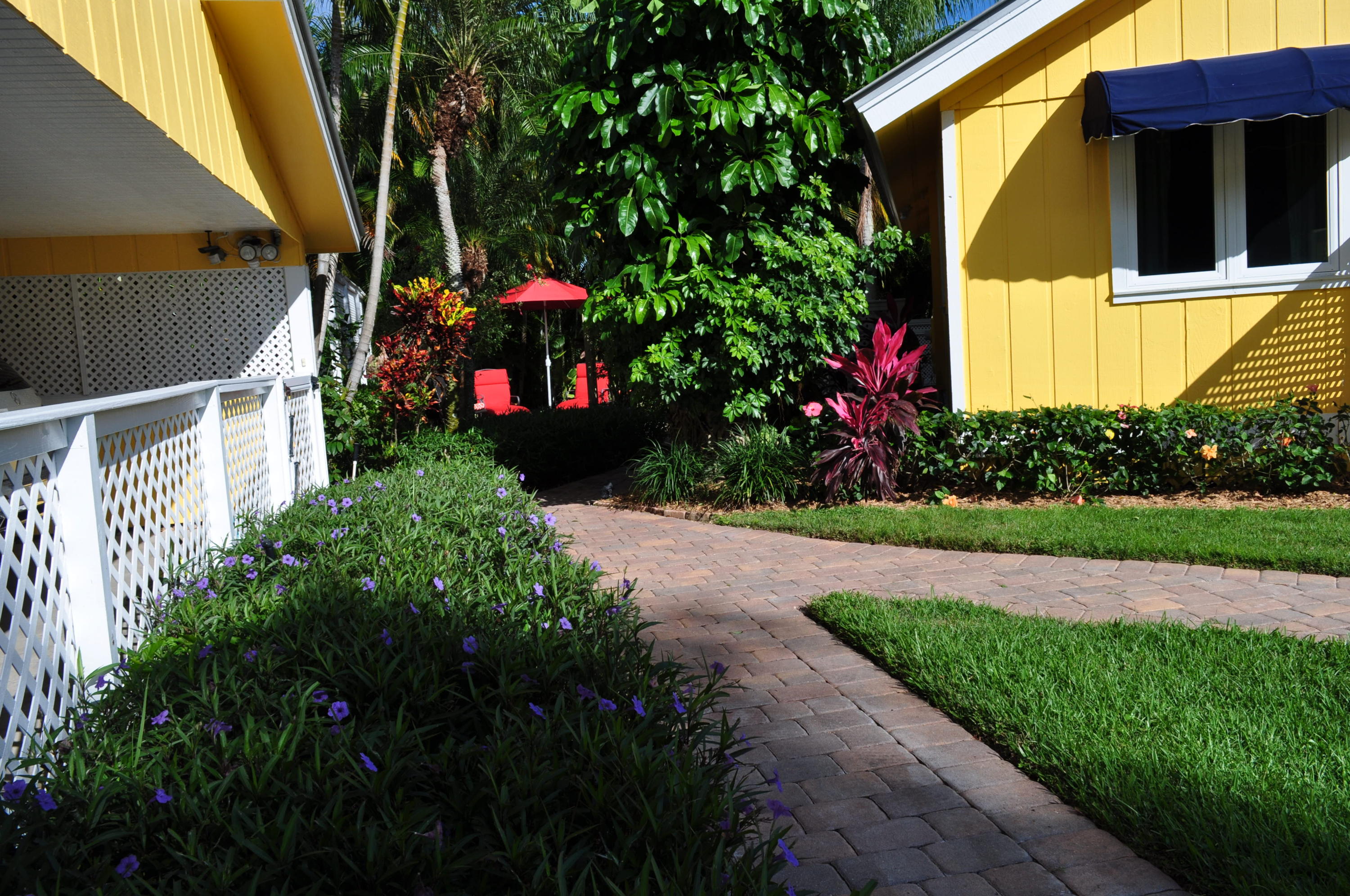 114 Faith Way Jupiter, FL 33458 - Photo 7 of 36 WALKWAY TO HOUSE