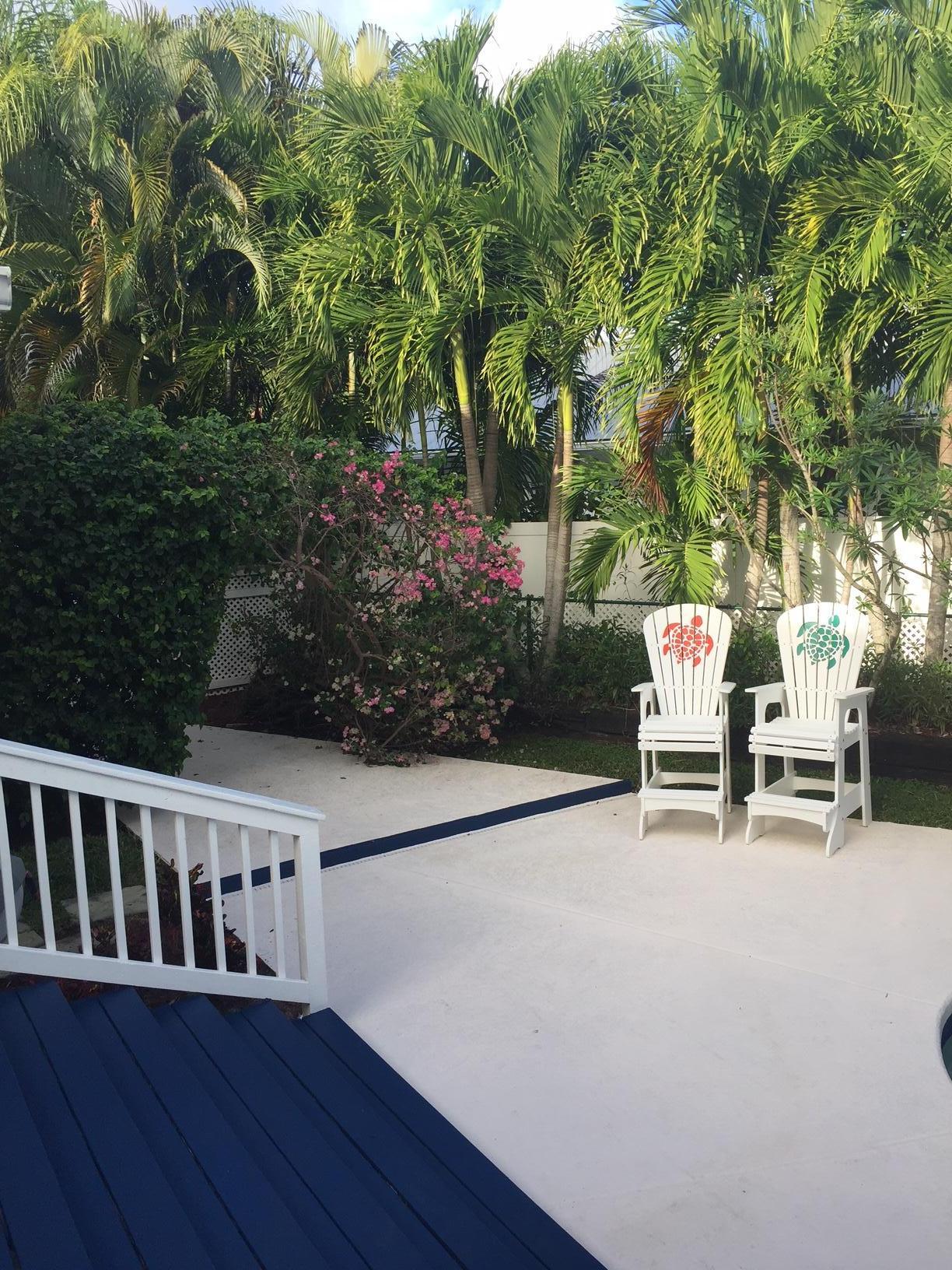 114 Faith Way Jupiter, FL 33458 - Photo 9 of 36 POOL WITH BOUGAINVILLA