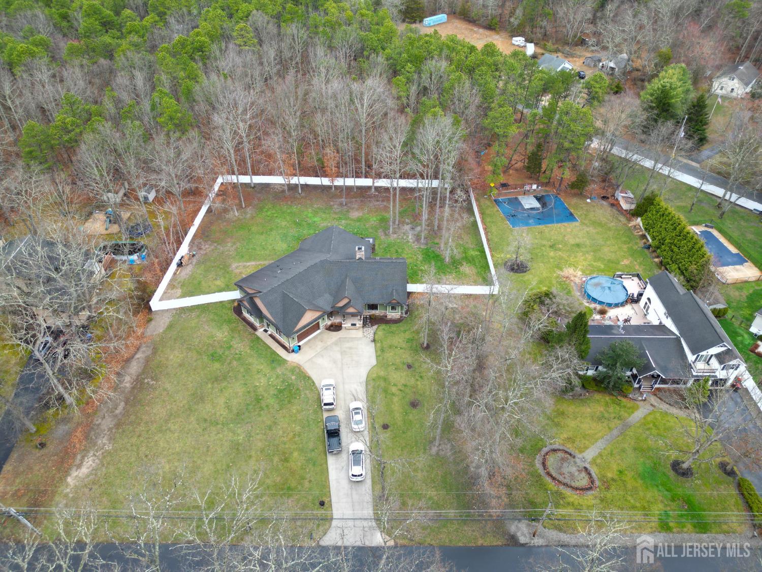 94 East Pleasant Grove Road Jackson, NJ 08527 - Photo 4 of 59 an aerial view of a house with a yard