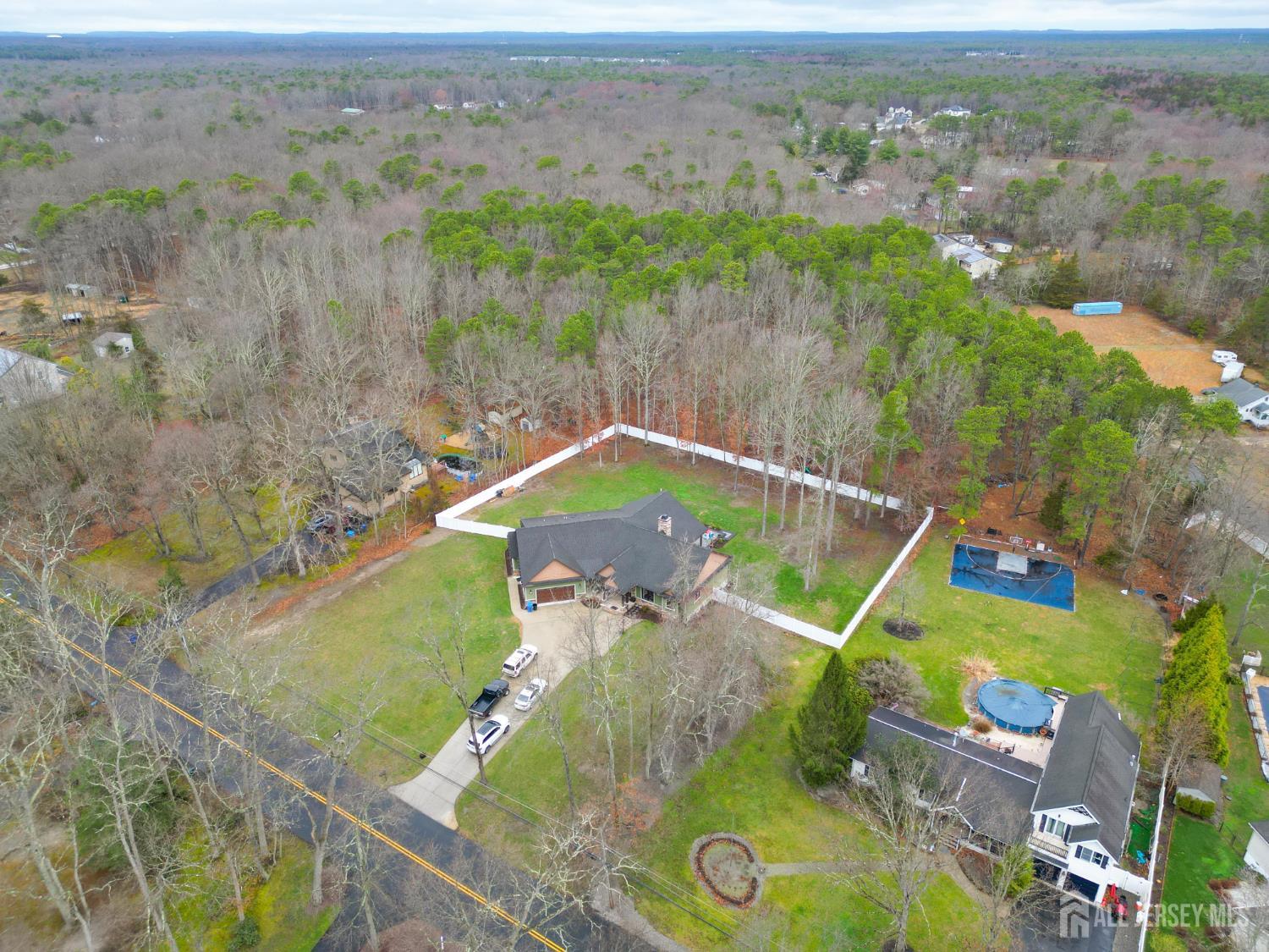 94 East Pleasant Grove Road Jackson, NJ 08527 - Photo 5 of 59 an aerial view of a house with a yard
