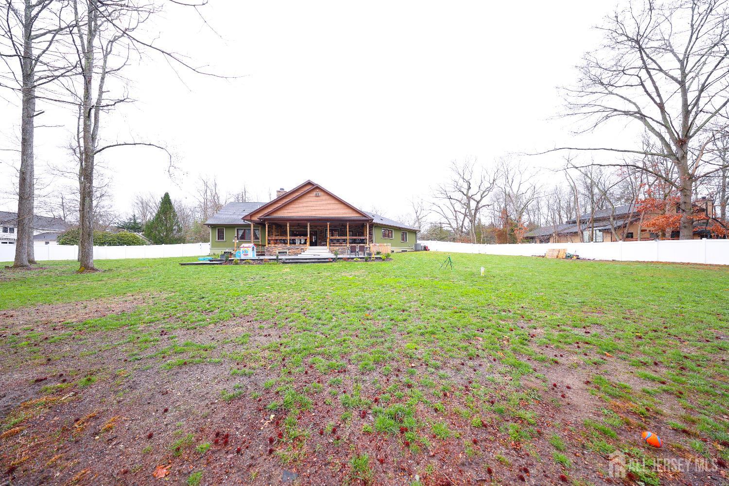 94 East Pleasant Grove Road Jackson, NJ 08527 - Photo 56 of 59 a view of an house with backyard and a tree