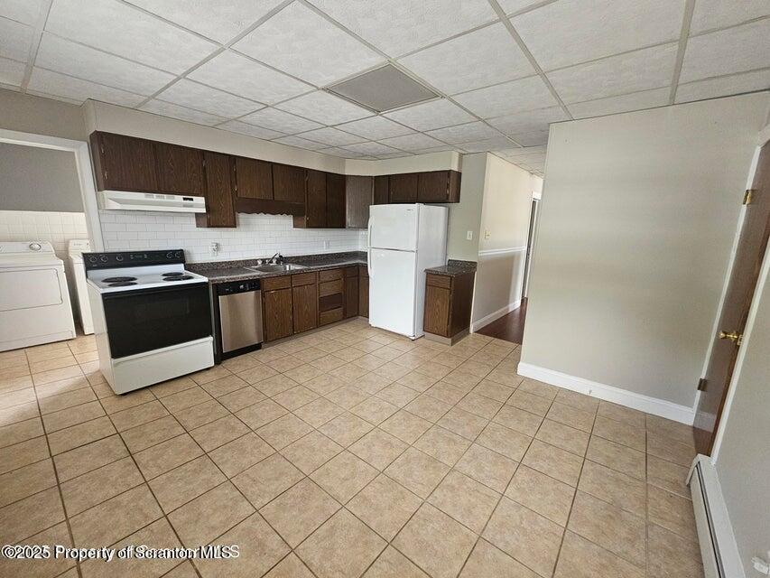 16 Swallow Street, Unit 1 Pittston, PA 18640 - Photo 2 of 14 a large white kitchen with stainless steel appliances