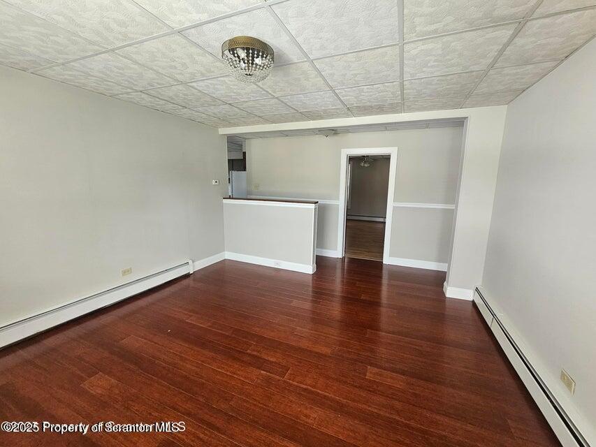 16 Swallow Street, Unit 1 Pittston, PA 18640 - Photo 5 of 14 an empty room with wooden floor