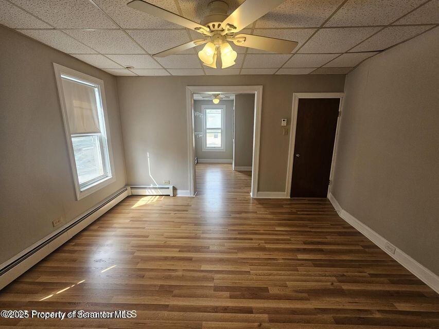 16 Swallow Street, Unit 1 Pittston, PA 18640 - Photo 7 of 14 a view of livingroom with hardwood floor and window