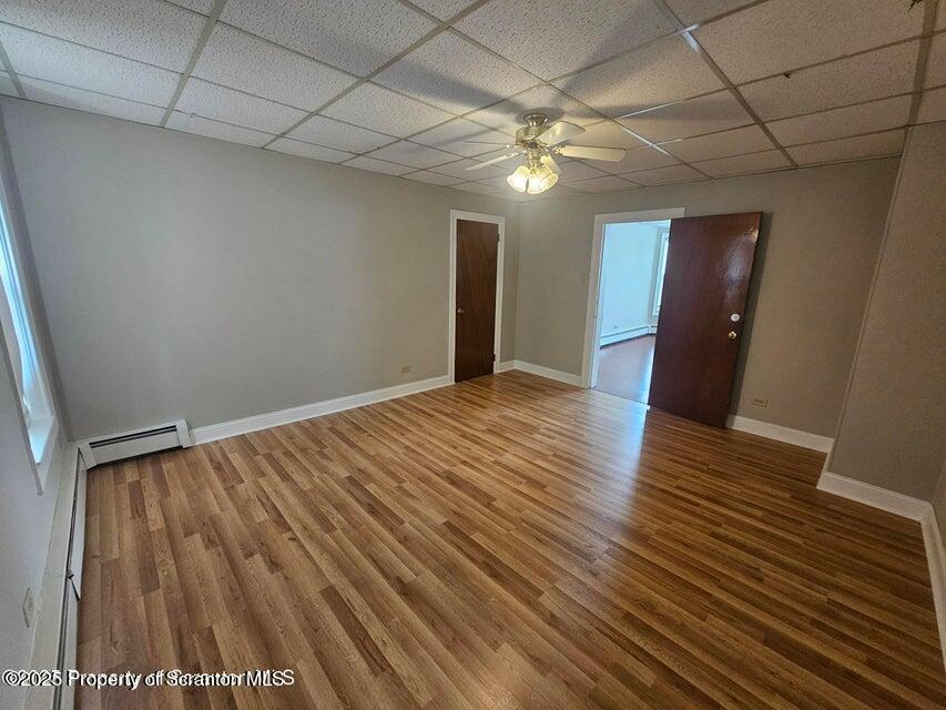 16 Swallow Street, Unit 1 Pittston, PA 18640 - Photo 9 of 14 a view of an empty room with wooden floor