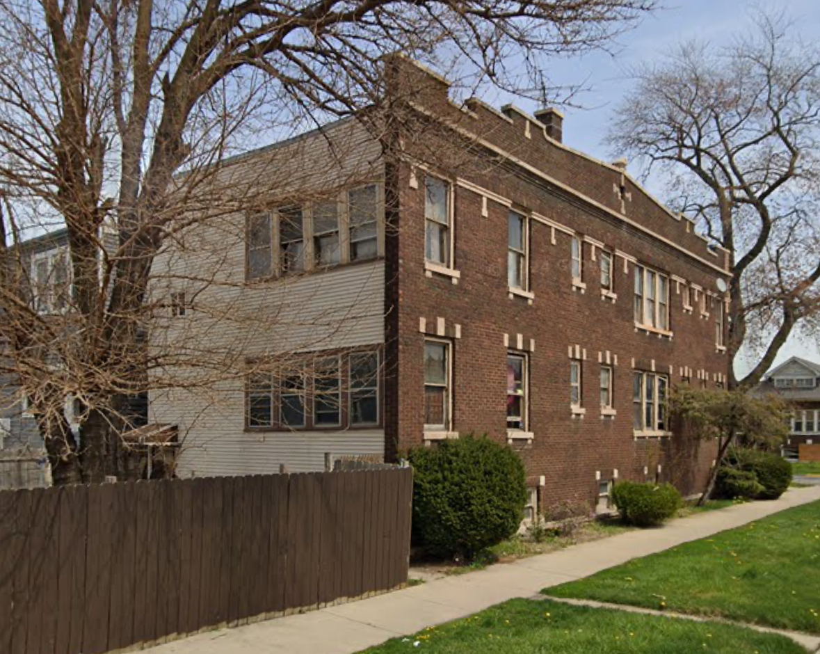 1838 48th Court Cicero, IL 60804 - Photo 13 of 13 a front view of a building with garden