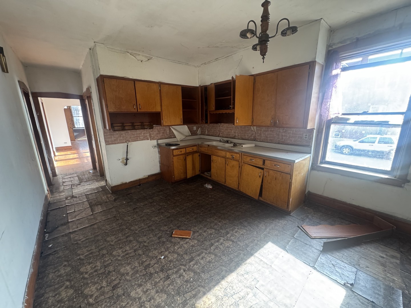 1838 48th Court Cicero, IL 60804 - Photo 5 of 13 a kitchen with stainless steel appliances granite countertop a sink stove and refrigerator