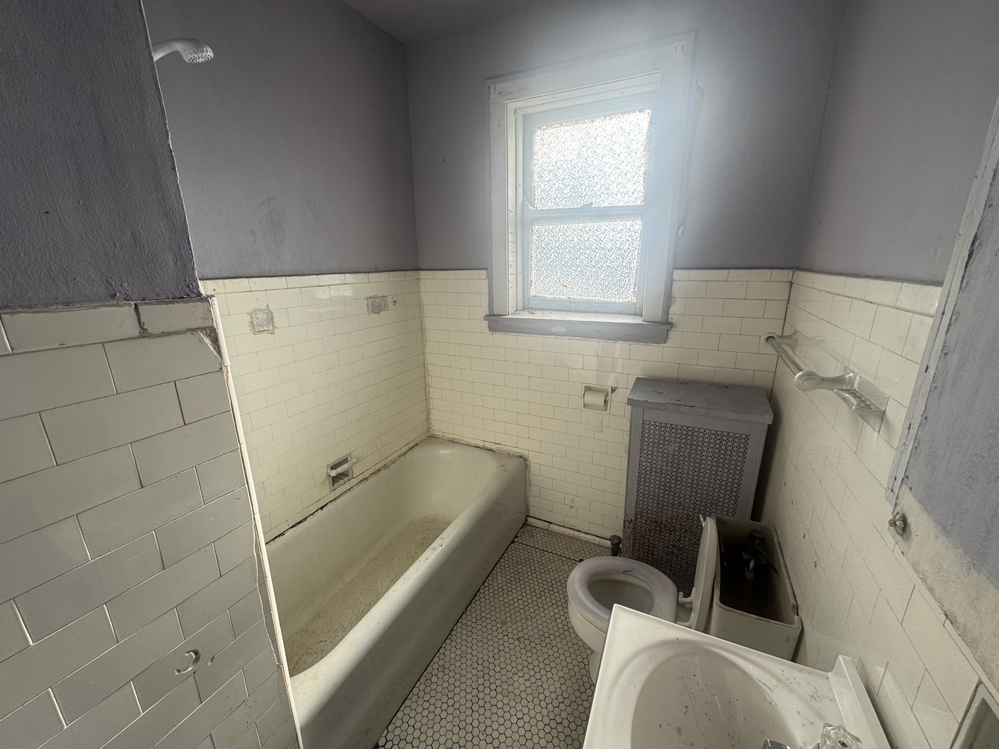 1838 48th Court Cicero, IL 60804 - Photo 6 of 13 a bathroom with a sink and a toilet