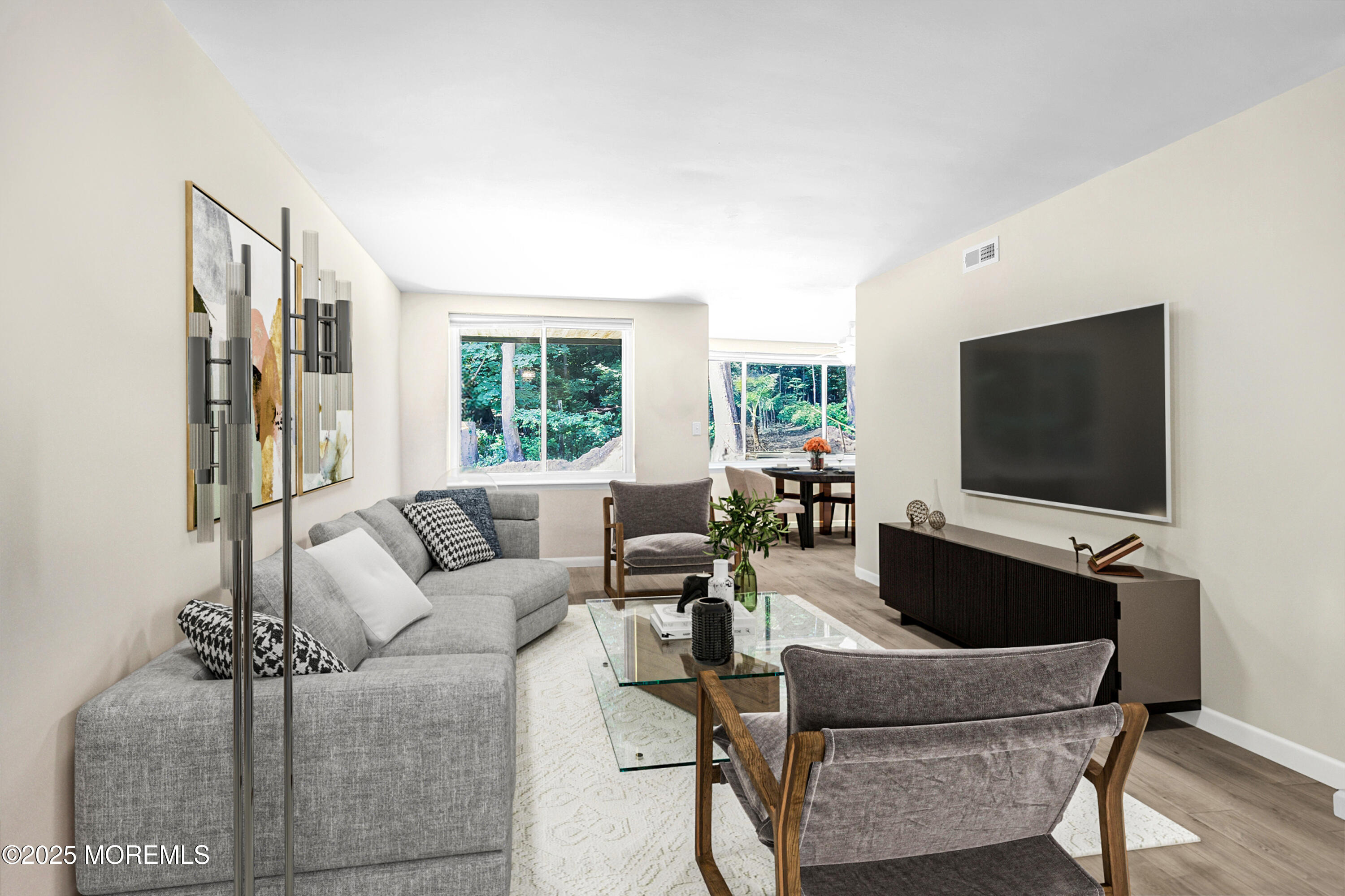 200 Portland Road, Unit E4 Highlands, NJ 07732 - Photo 1 of 37 a living room with furniture and a flat screen tv