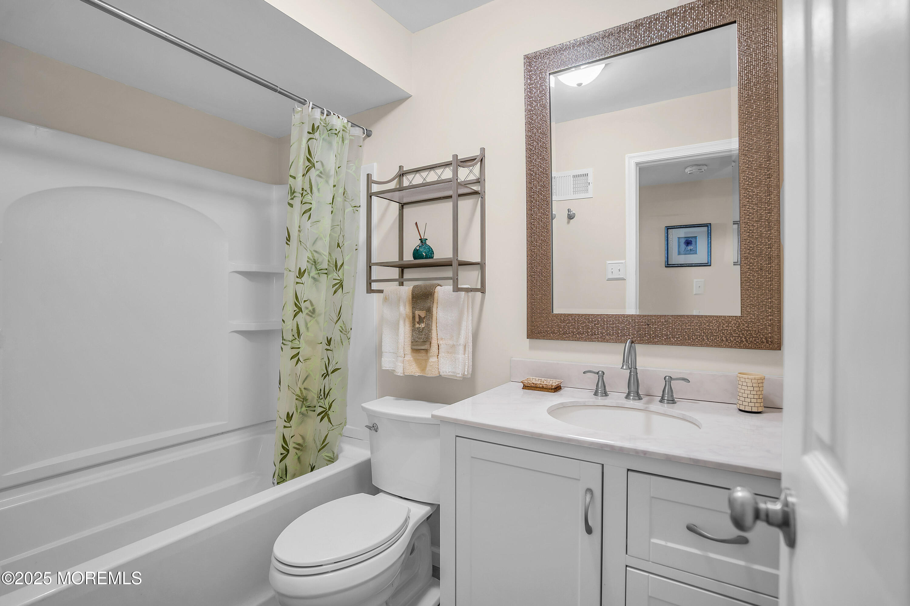 200 Portland Road, Unit E4 Highlands, NJ 07732 - Photo 18 of 37 a bathroom with a sink a toilet and shower