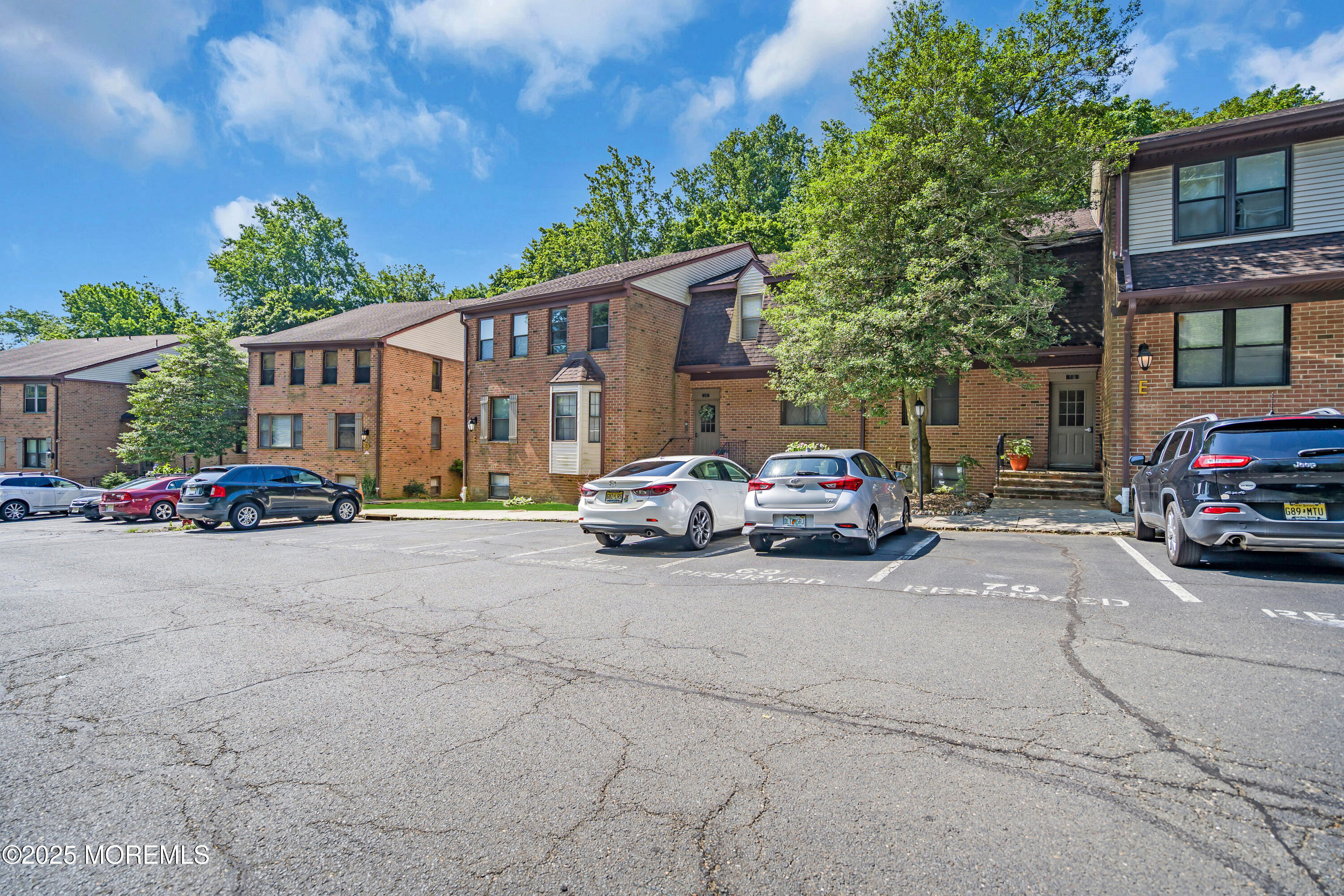 200 Portland Road, Unit E4 Highlands, NJ 07732 - Photo 26 of 37 a car parked in front of a house