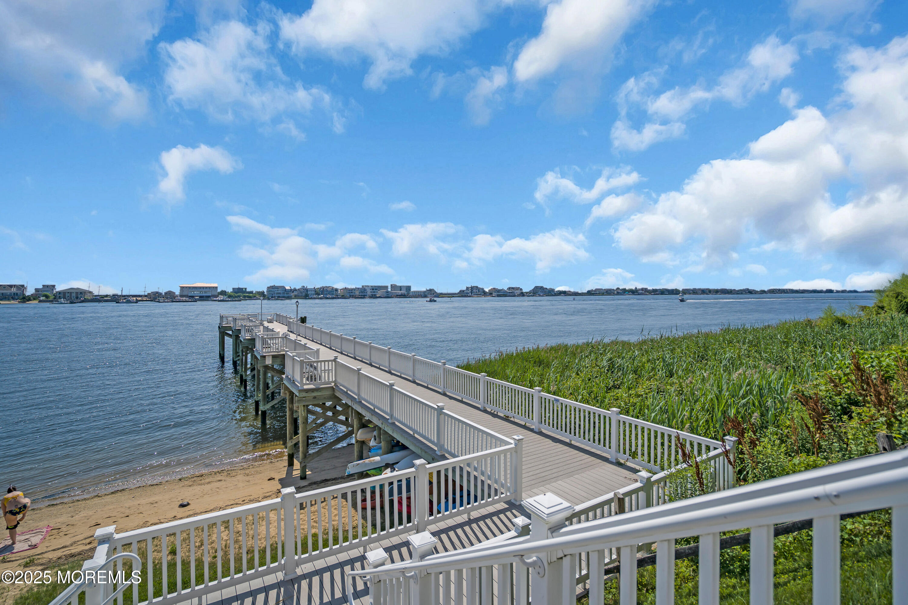 200 Portland Road, Unit E4 Highlands, NJ 07732 - Photo 30 of 37 a view of a roof deck with wooden floor and fence