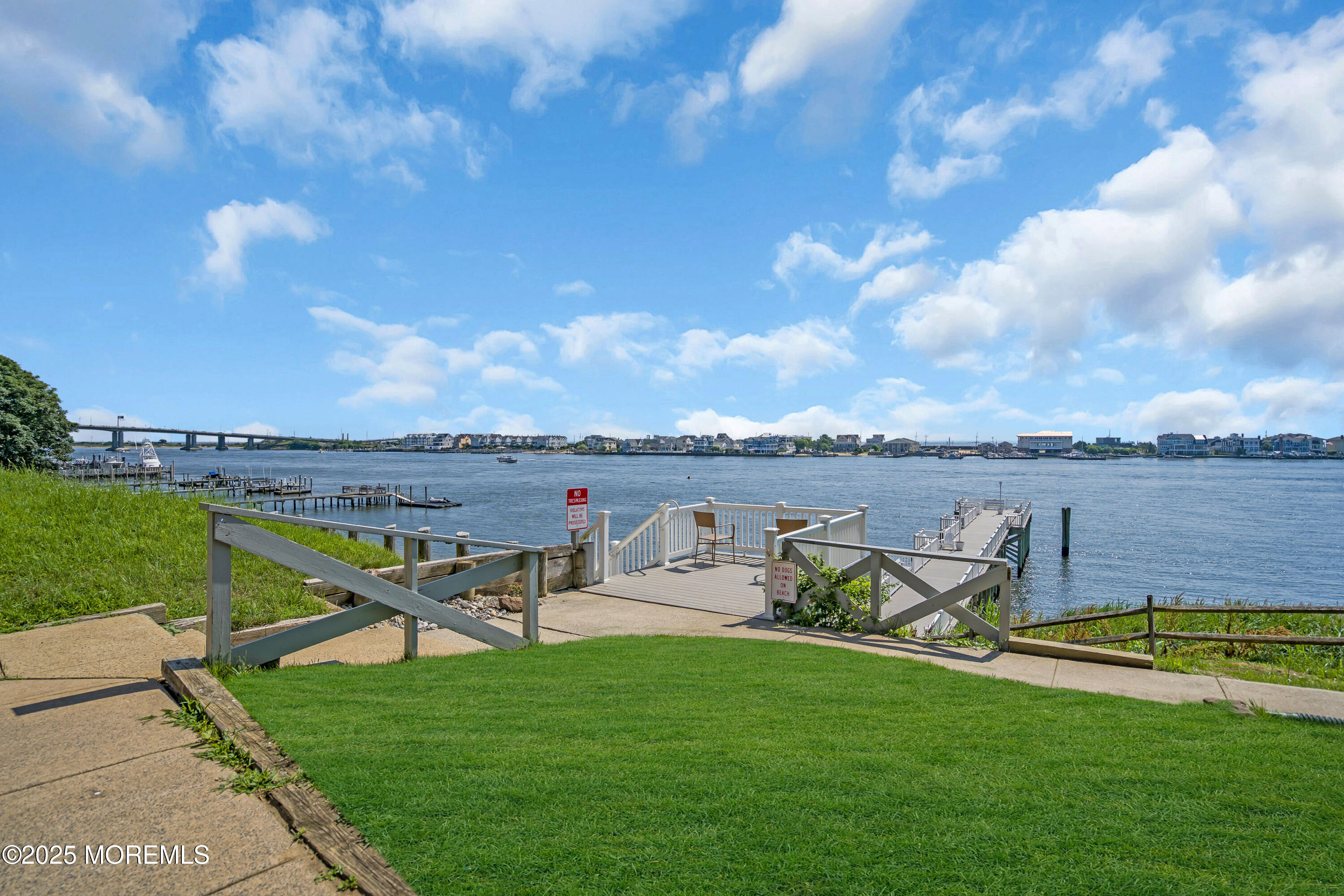 200 Portland Road, Unit E4 Highlands, NJ 07732 - Photo 32 of 37 a view of a lake with houses in the back