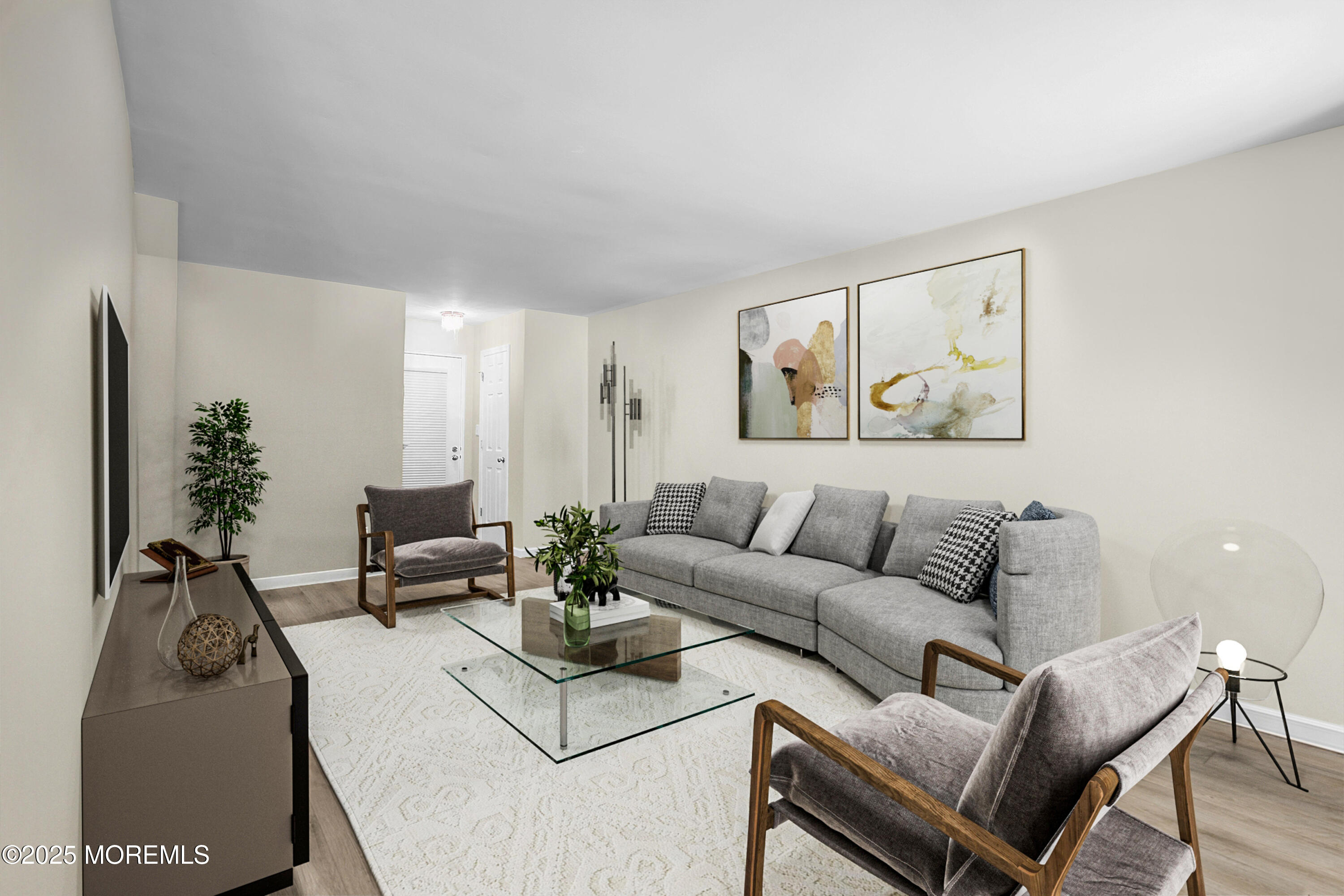 200 Portland Road, Unit E4 Highlands, NJ 07732 - Photo 6 of 37 a living room with furniture rug and wooden floor