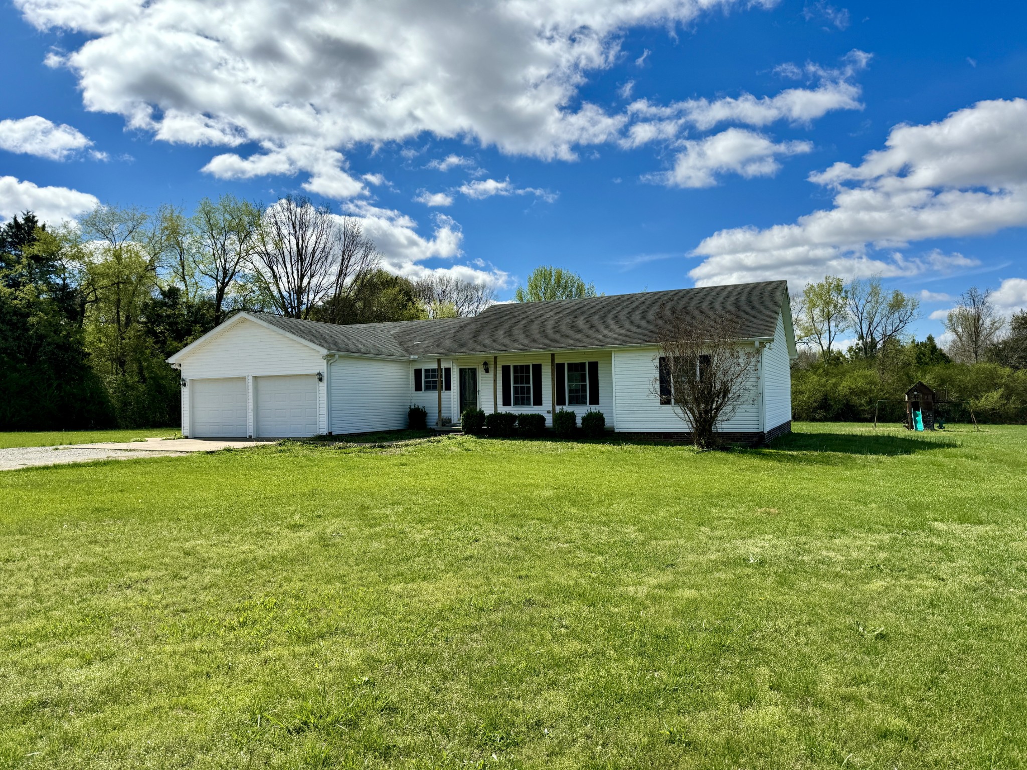 35 Whitaker Bend Road Linden, TN 37096 - Photo 1 of 36 a view of a house with a backyard
