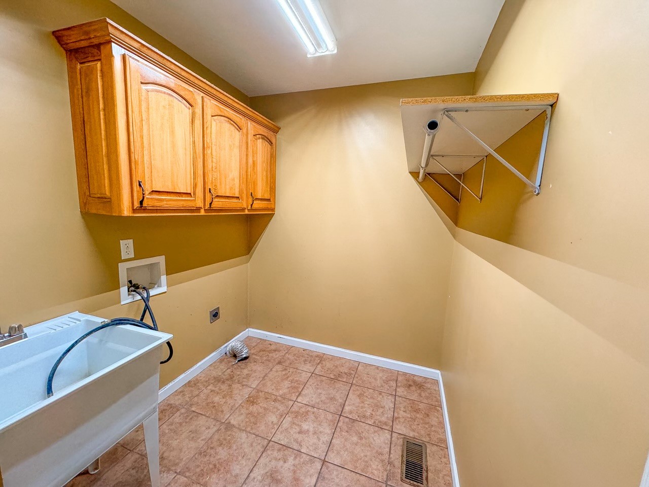 35 Whitaker Bend Road Linden, TN 37096 - Photo 14 of 36 a bathroom with a granite countertop sink and a mirror