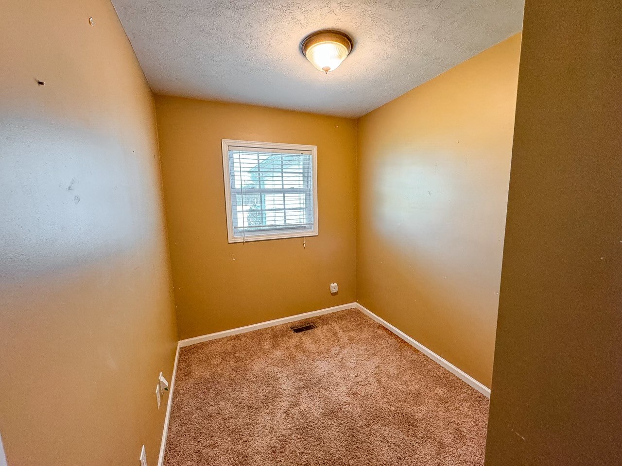 35 Whitaker Bend Road Linden, TN 37096 - Photo 15 of 36 an empty room with windows
