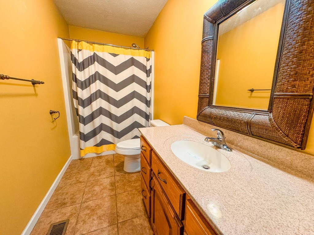 35 Whitaker Bend Road Linden, TN 37096 - Photo 18 of 36 a bathroom with a sink and a mirror