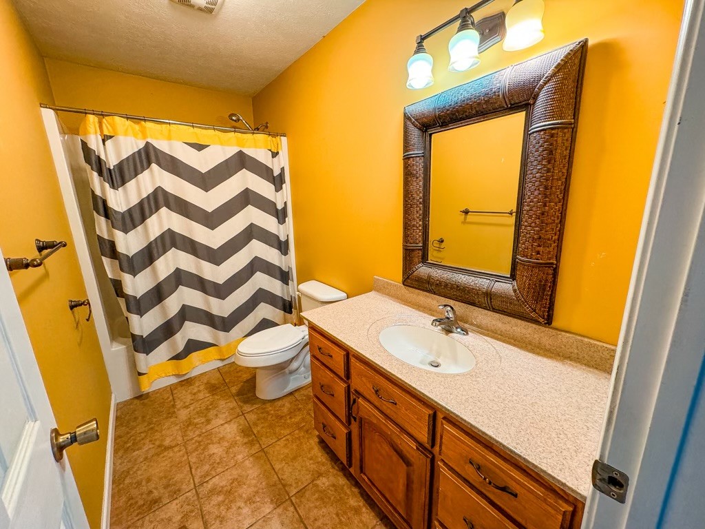 35 Whitaker Bend Road Linden, TN 37096 - Photo 19 of 36 a bathroom with a sink and a mirror