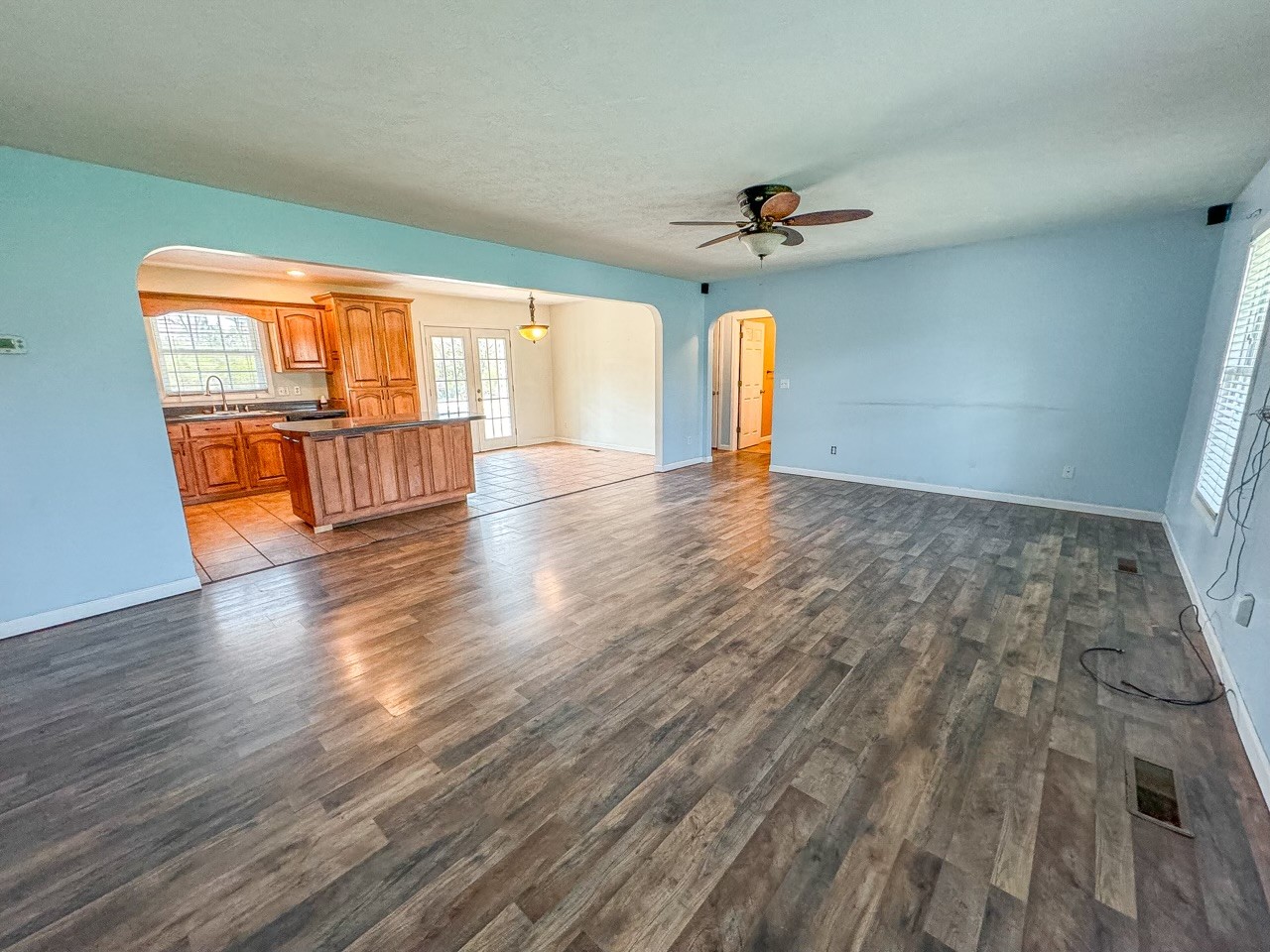 35 Whitaker Bend Road Linden, TN 37096 - Photo 2 of 36 wooden floor in an empty room with a window