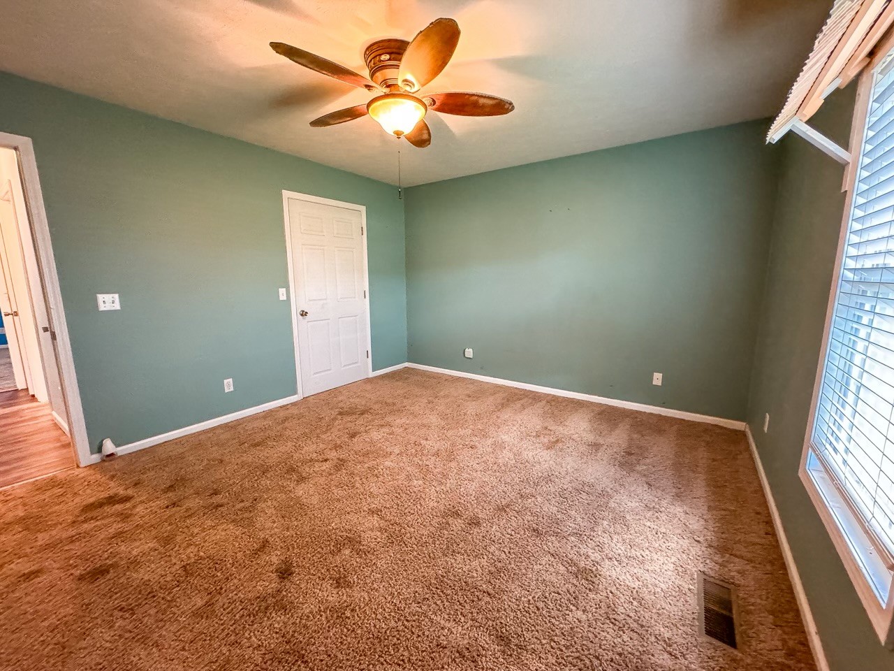 35 Whitaker Bend Road Linden, TN 37096 - Photo 21 of 36 a view of a big room with windows and chandelier fan