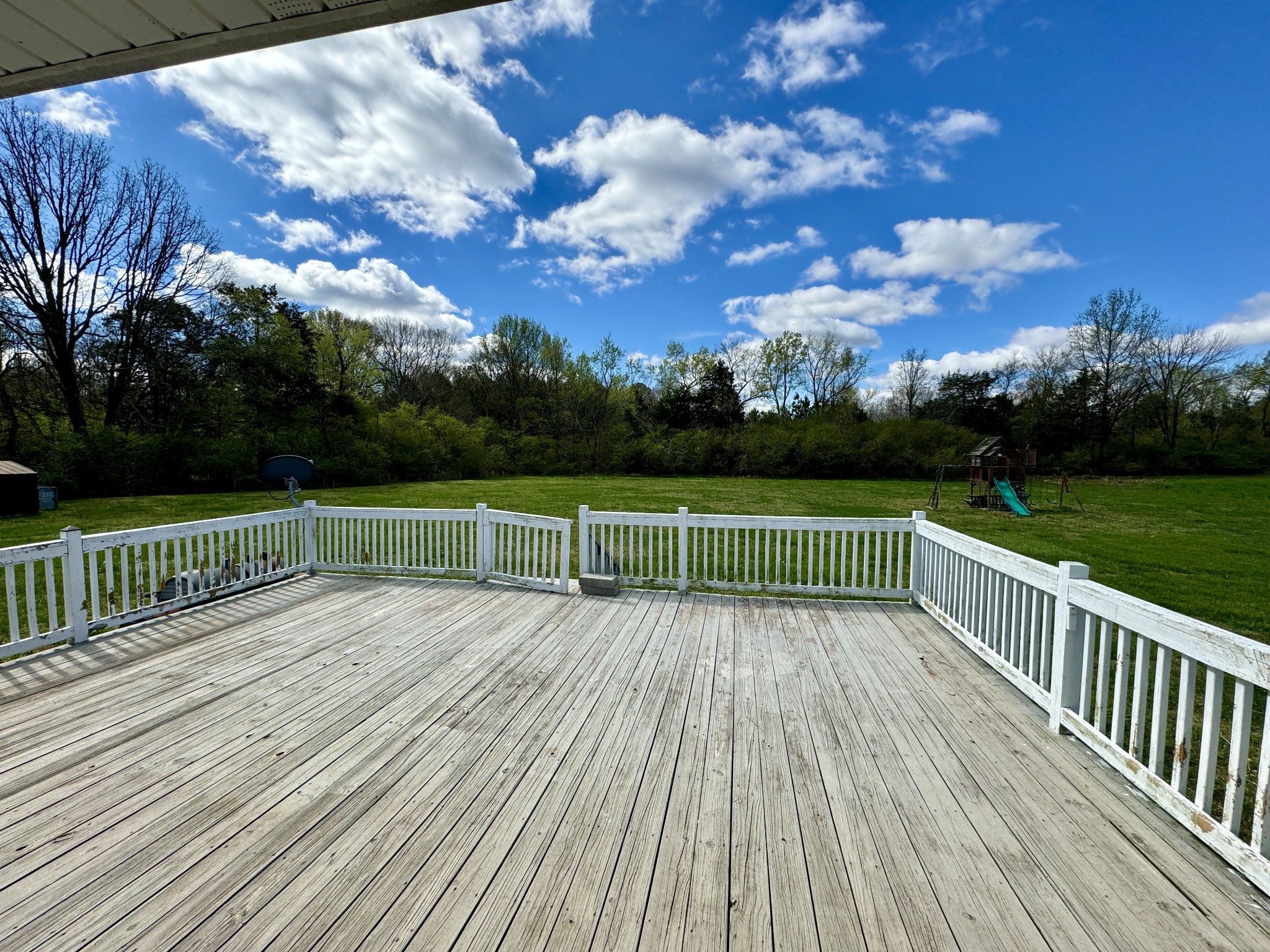 35 Whitaker Bend Road Linden, TN 37096 - Photo 29 of 36 a view of a deck with a big yard