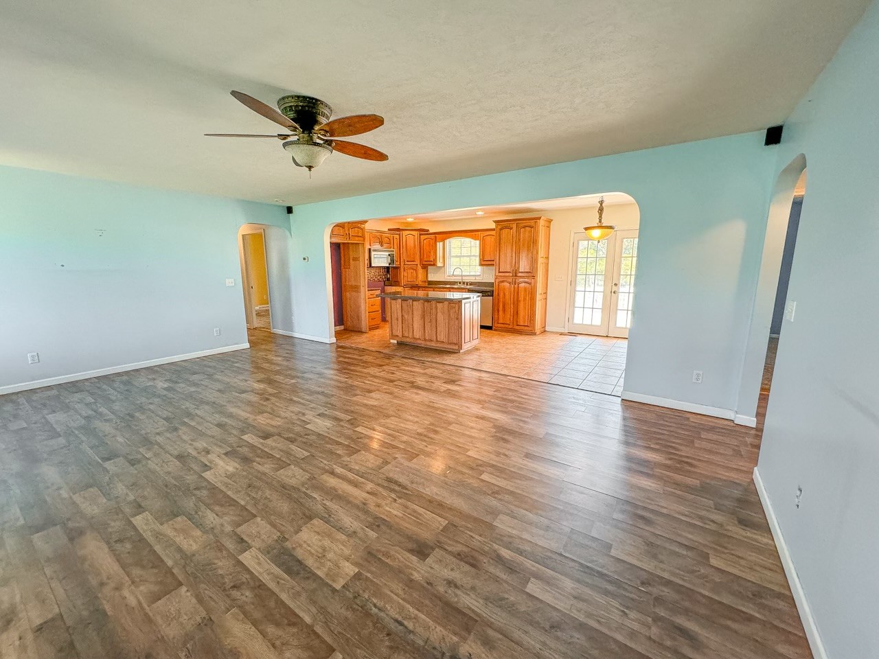 35 Whitaker Bend Road Linden, TN 37096 - Photo 3 of 36 a view of empty room with wooden floor and fan