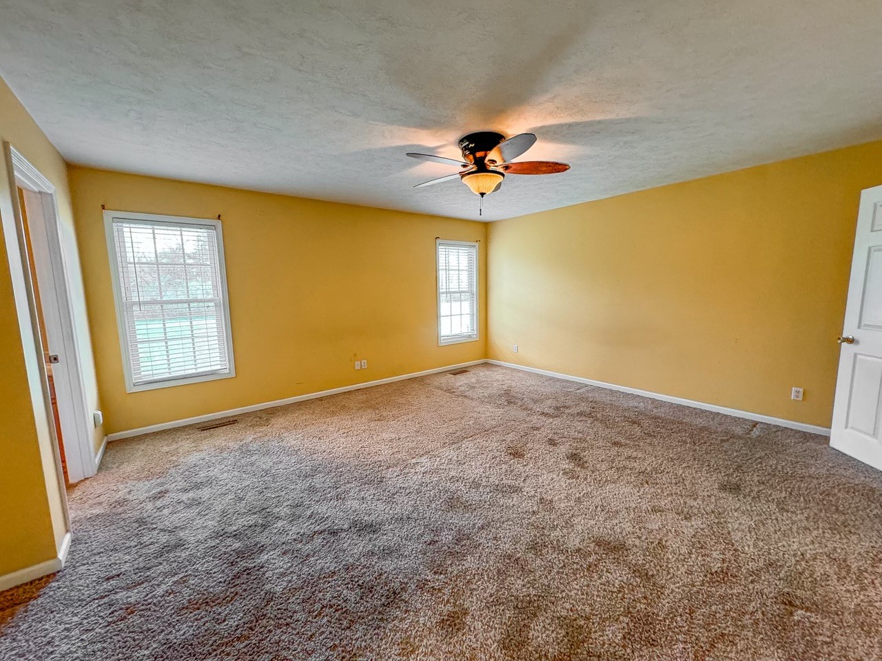 35 Whitaker Bend Road Linden, TN 37096 - Photo 7 of 36 wooden floor in an empty room with a window