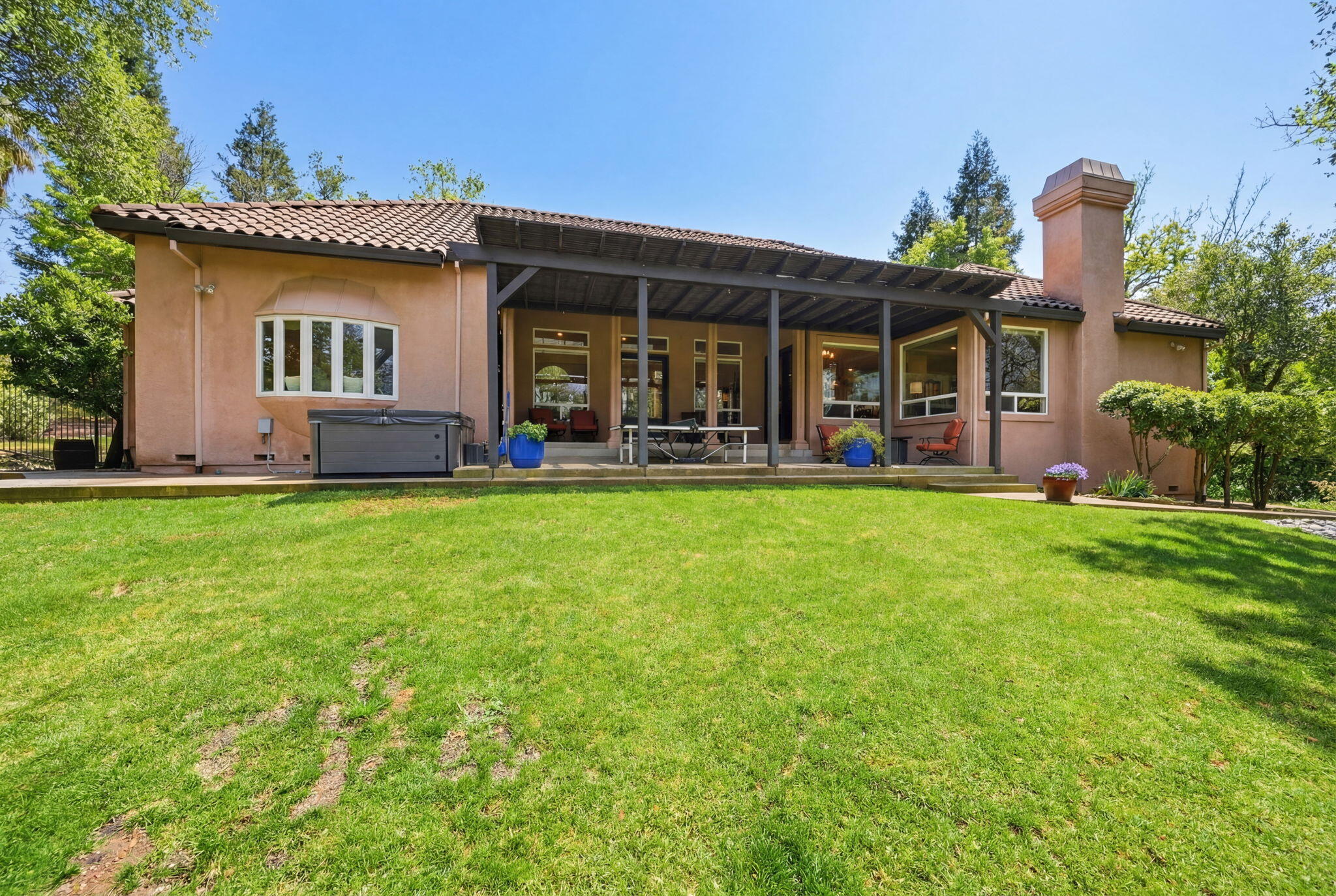 13482 Tierra Heights Road Redding, CA 96003 - Photo 30 of 41 a view of a house with a yard and sitting area