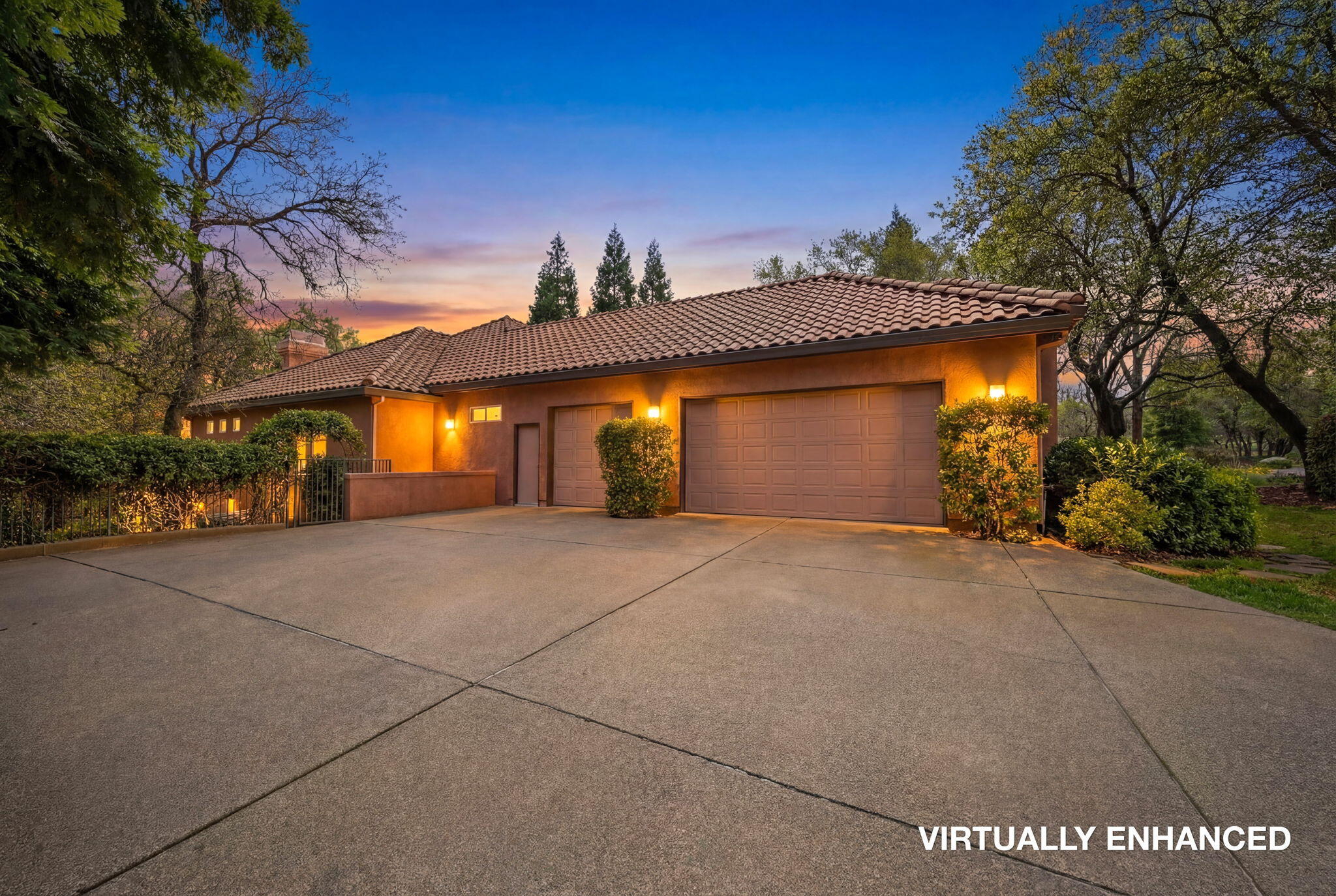 13482 Tierra Heights Road Redding, CA 96003 - Photo 38 of 41 a front view of a house with a yard and garage