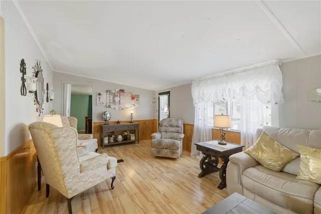 a living room with furniture or couch and a window