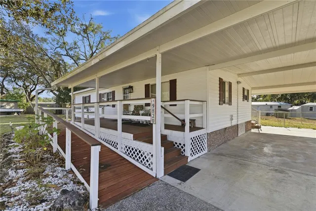 a view of balcony with deck and stairs