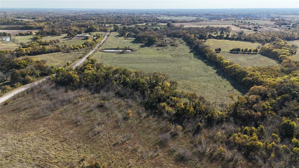 464 North Rd Princeton Tx 75407 Road Princeton, TX 75407 - Photo 7 of 14 an aerial view of residential houses with outdoor space and trees
