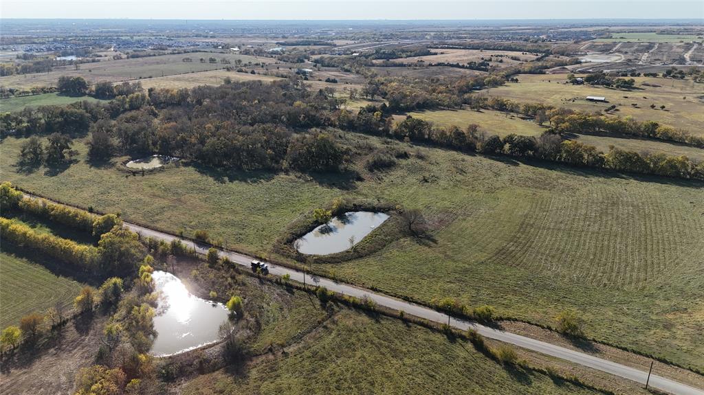 464 North Rd Princeton Tx 75407 Road Princeton, TX 75407 - Photo 8 of 14 an aerial view of a house with a yard