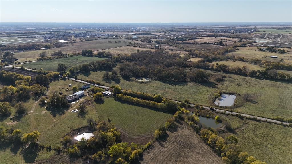 464 North Rd Princeton Tx 75407 Road Princeton, TX 75407 - Photo 10 of 14 an aerial view of a city with lots of residential buildings